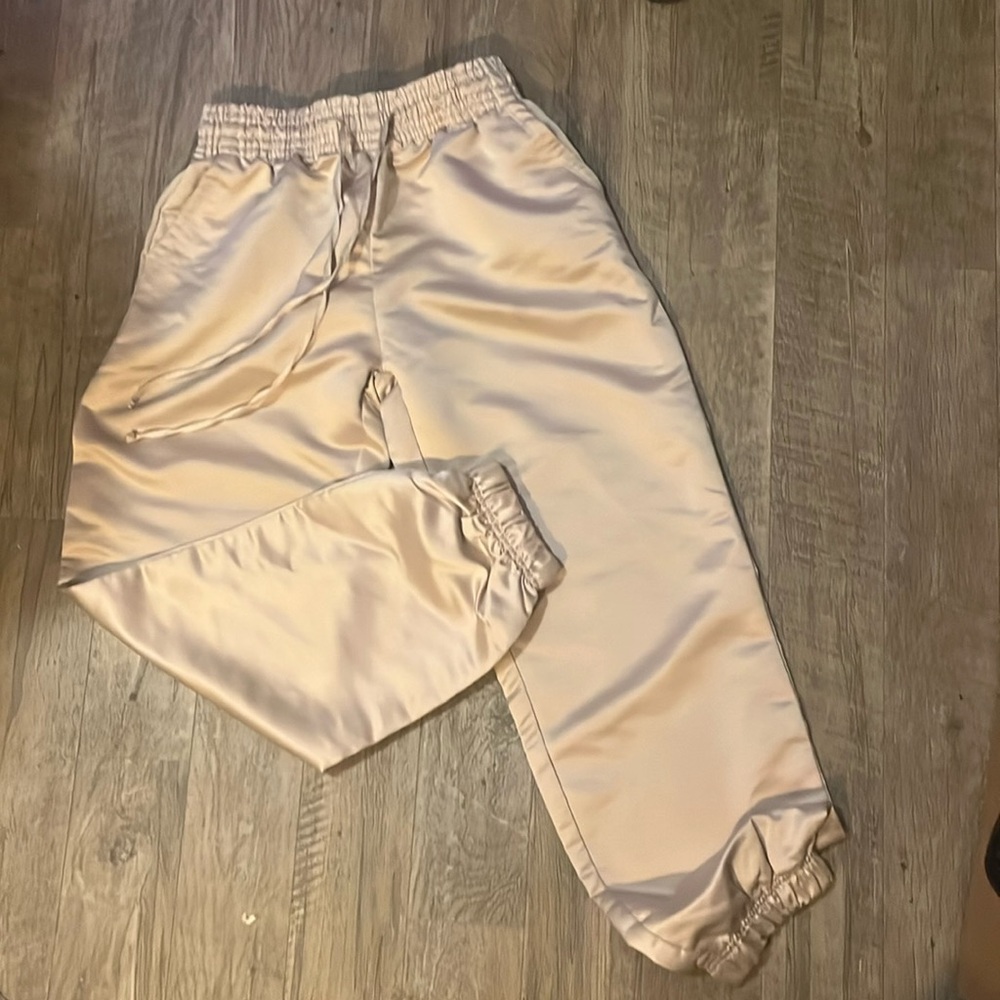 Gold sweatpants 
Dress up or down!